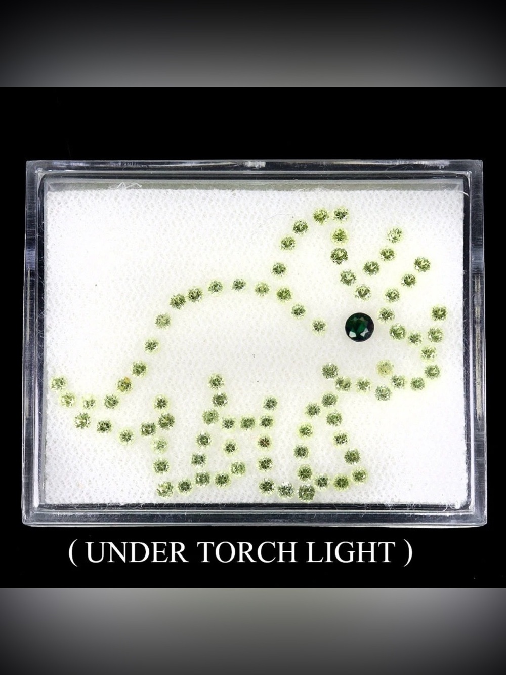 Natural 85ct round Gems Peridot 2mm + a 3mm Black Fire Opal 3.03CT Triceratops
